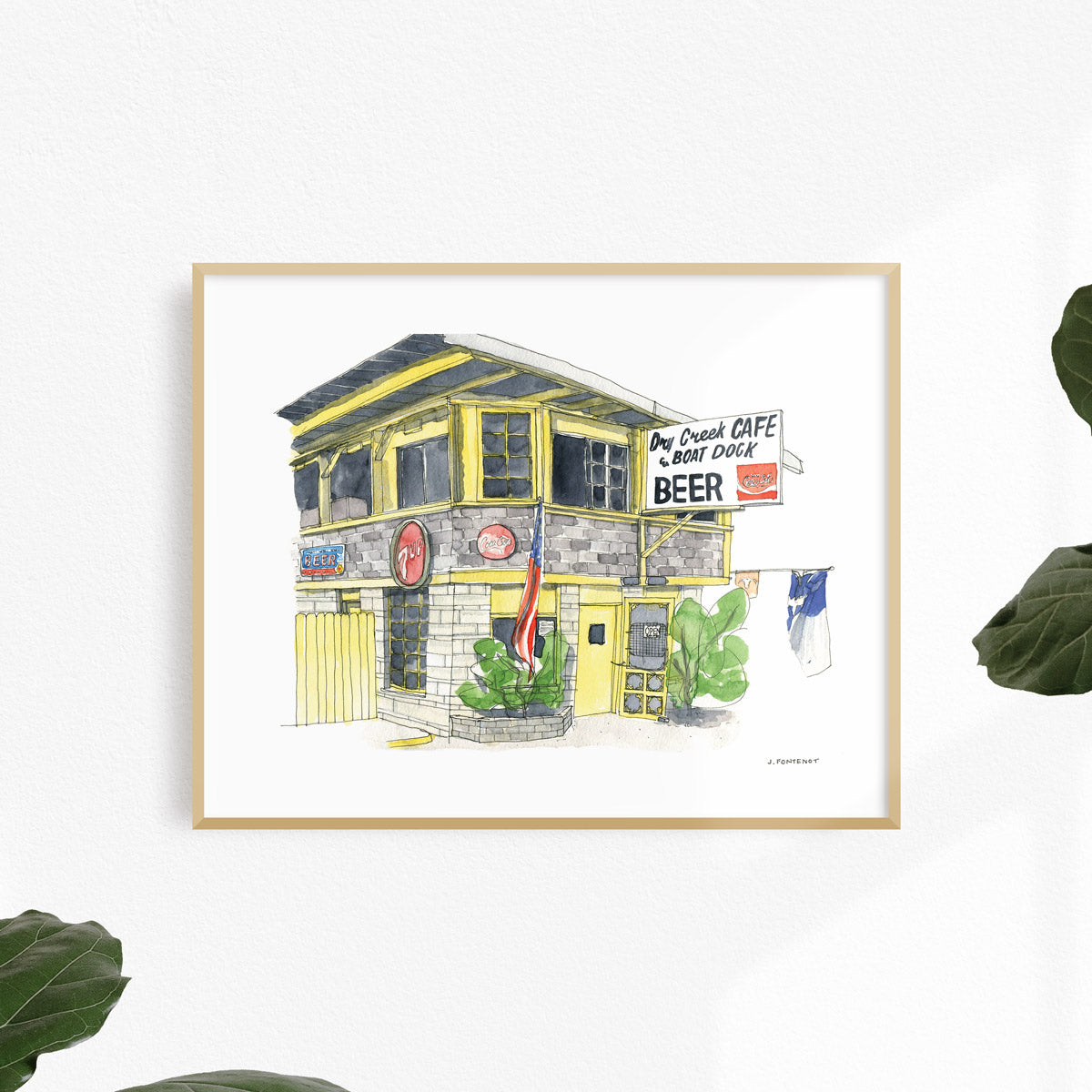 Watercolor painting and ink drawing of Dry Creek Cafe in west Austin, Texas art print framed on a white wall. Framed wall art