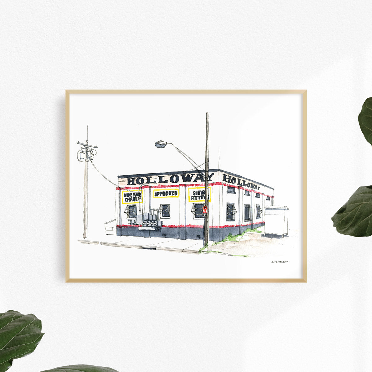 Watercolor painting and ink drawing of warehouse in East Austin art print framed on a white wall. Framed wall art