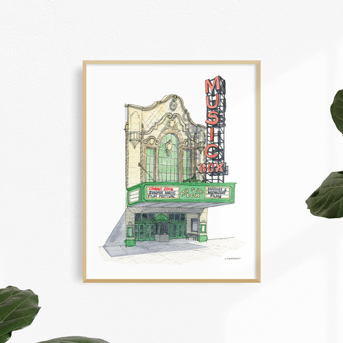 Watercolor painting and ink drawing of Music Box Theatre in Chicago art print framed on a white wall.