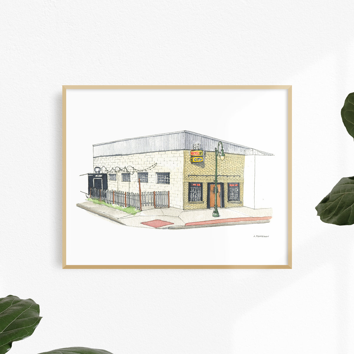 Watercolor painting and ink drawing of Nickel City in East Austin, Texas art print framed on a white wall. Framed wall art