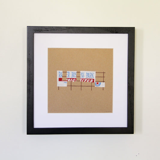 Framed artwork hung on white wall. Colored pencil drawing on tan toned paper of a red and white road sign with a 2 inch white matte around the art in a black wood frame.
