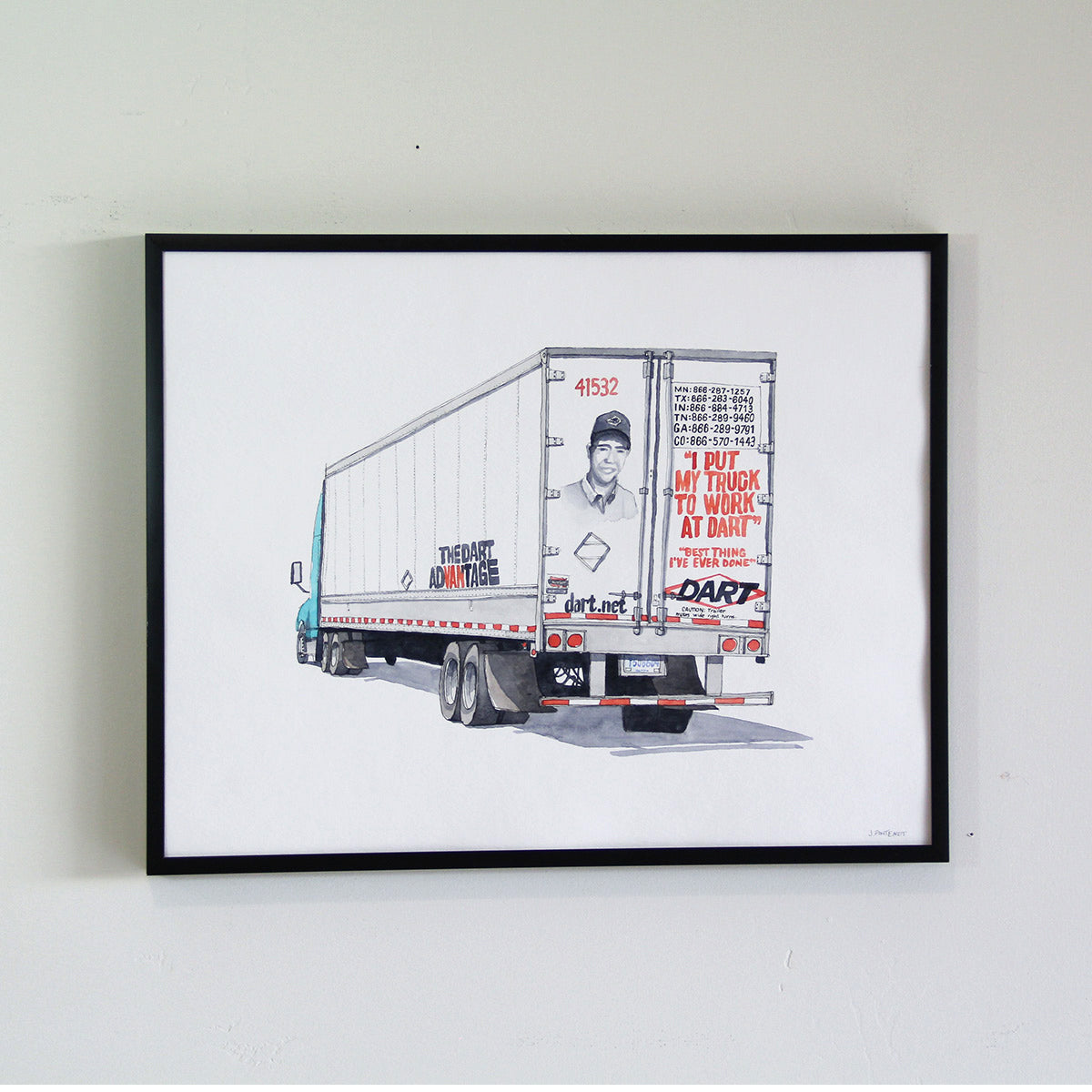 Framed original art hung on the wall with thin black metal frame. Watercolor painting of DART truck.