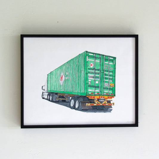 Framed original artwork hung on wall in thin black metal frame. Watercolor of green container truck